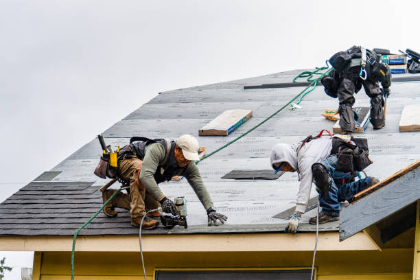 Professional Gutter Installation technician working in Remsenburg, NY